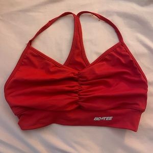Bo and tee red slinky ruched v neck sports bra
